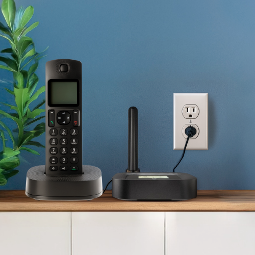 HouseCall home phone adapter — a compact white cellular device with external antenna and signal indicator light